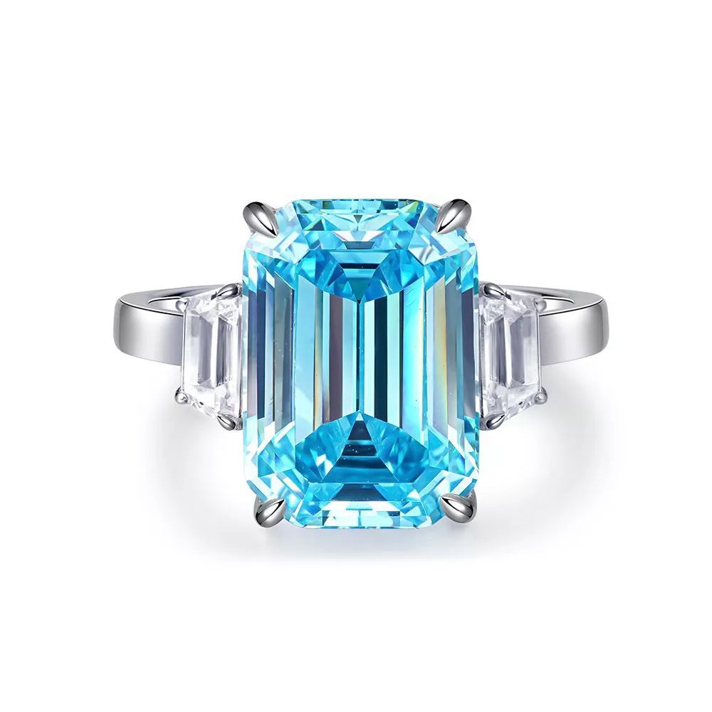 sky blue ring with three-stone setting and none