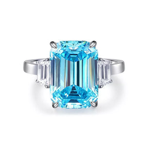 sky blue ring with three-stone setting and none