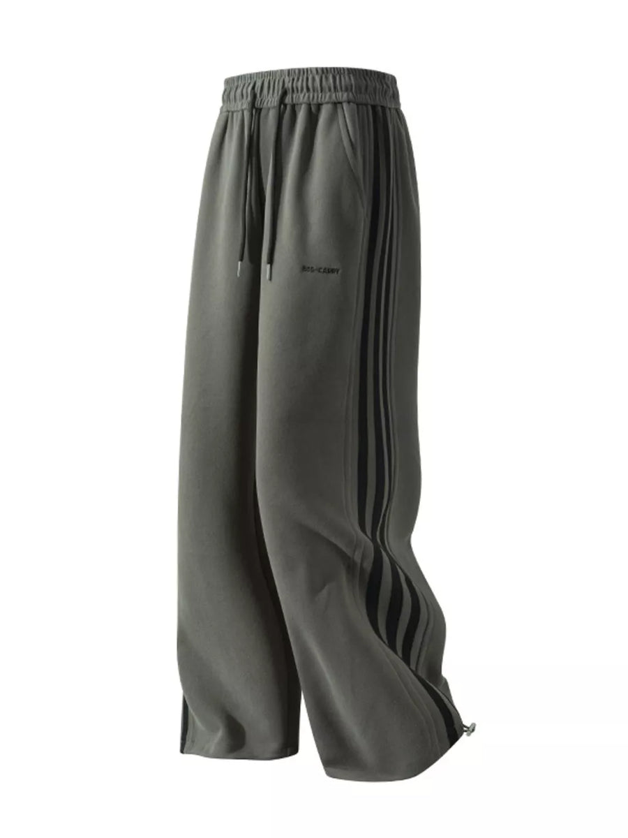 Men's grey sweatpants with black side stripes and drawstring waist