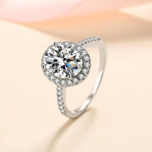 925 sterling silver,Moissanite Carat weight: 1ct Care instructions: Avoid wearin ring in clear with fitted silhouette