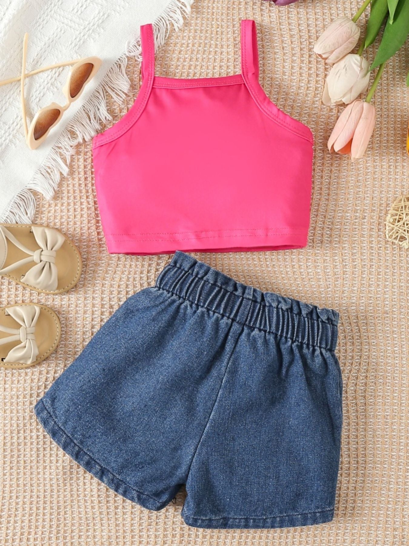 Baby girl's pink cotton cami and denim shorts set with elastic waist.