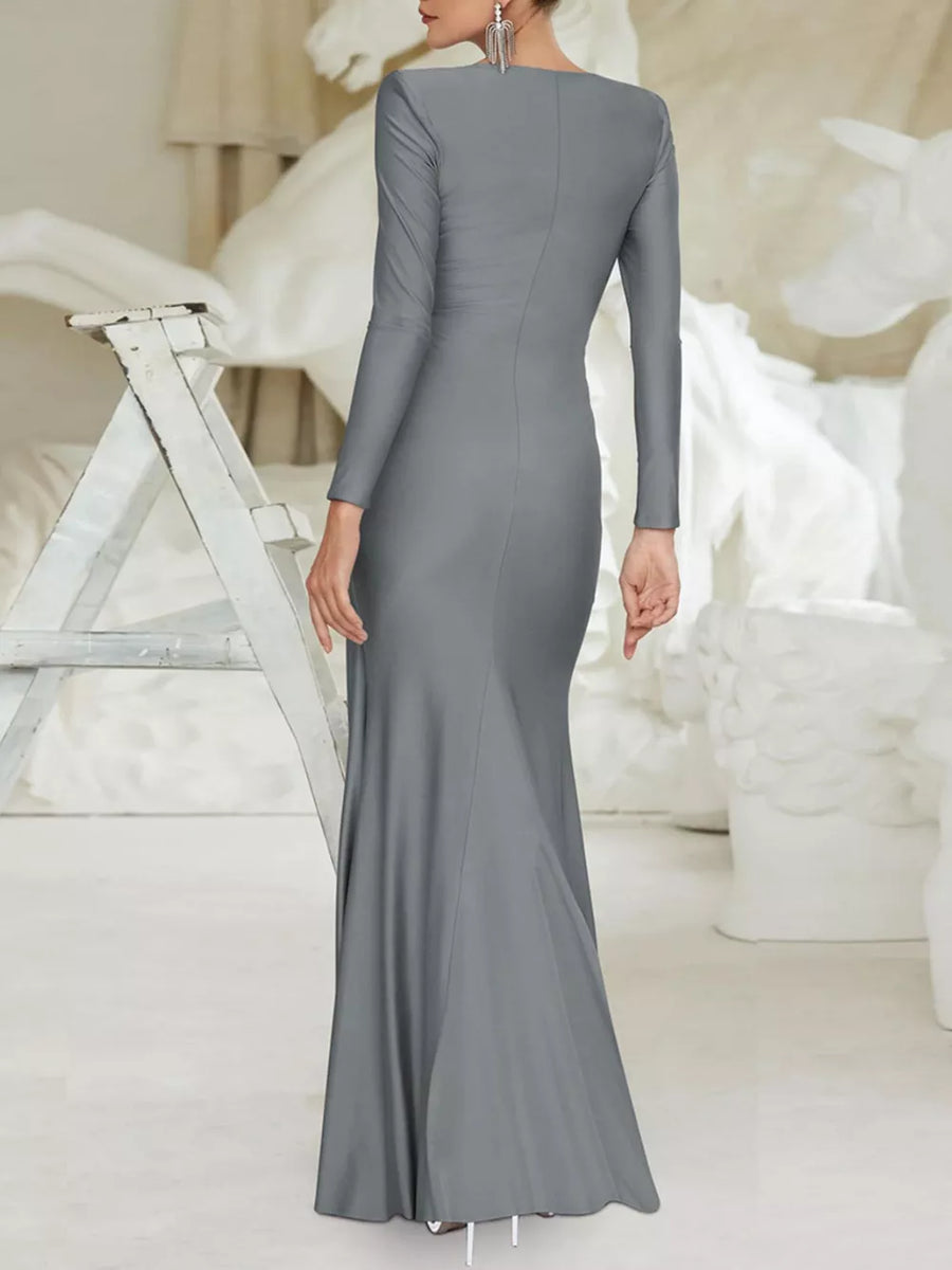 Gray ruched long sleeve maxi dress with boat neckline and bodycon fit.