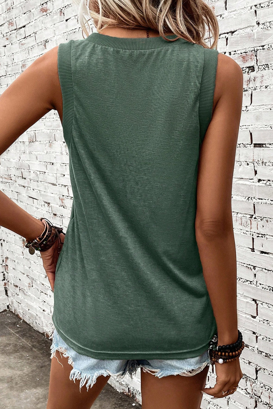 Distressed flag graphic tank top in black forest with ribbed neckline and armholes.