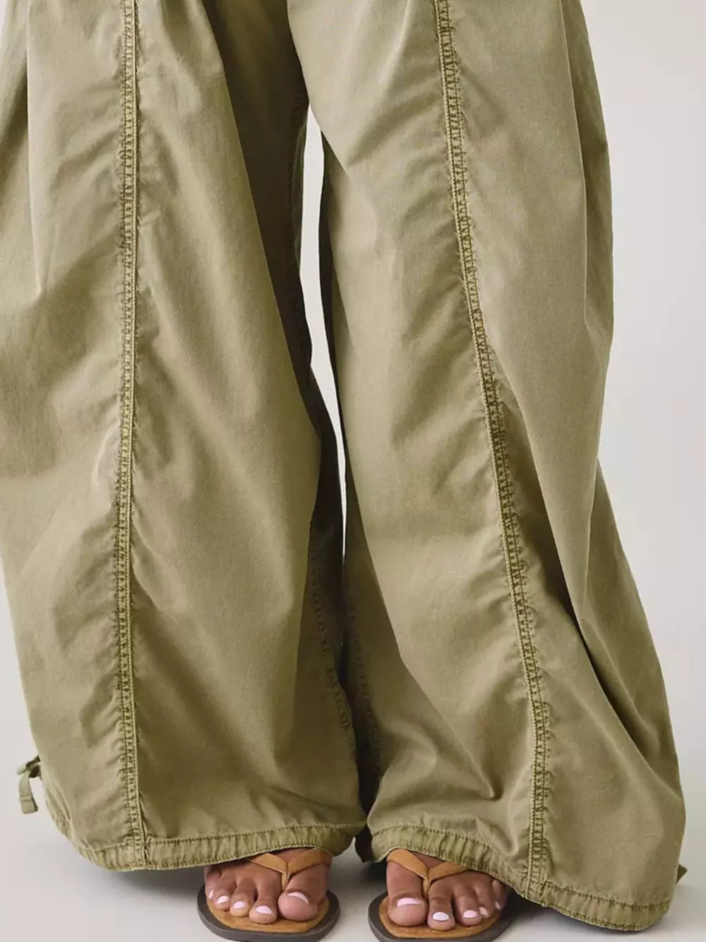 100% polyester Care instructions: Machine wash cold cargo pants in White with wide-leg silhouette