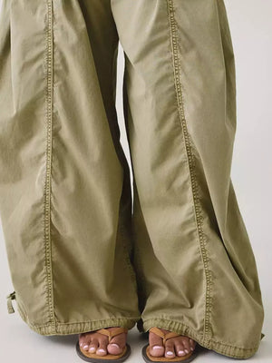 100% polyester Care instructions: Machine wash cold cargo pants in White with wide-leg silhouette