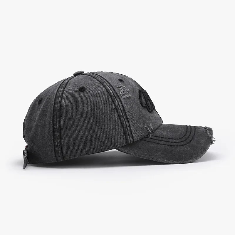 Black distressed cotton baseball cap with embroidered detail