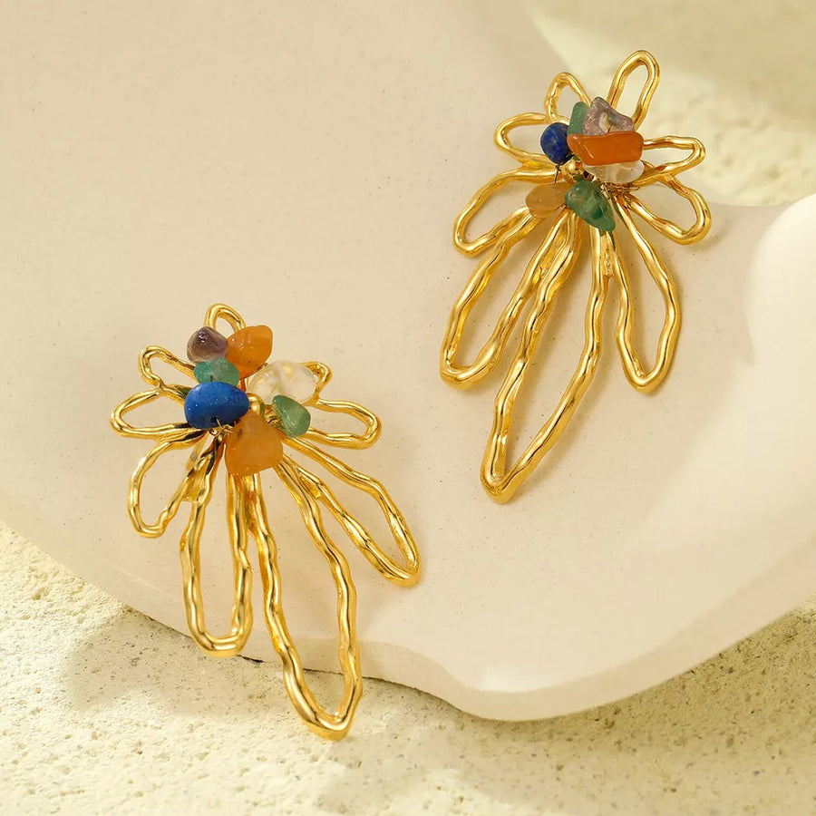 blue earrings featuring natural stone and floral