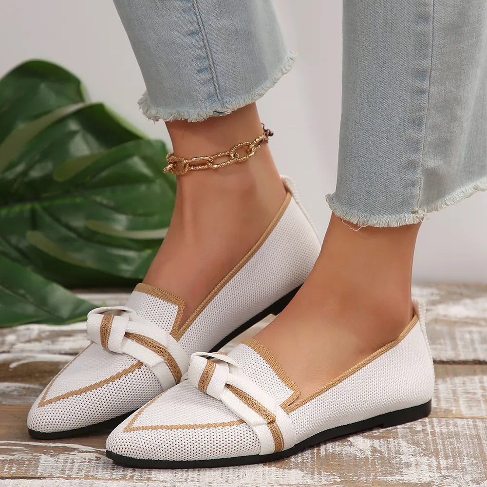 White mesh pointe slip-on flats with bow detail and tan trim