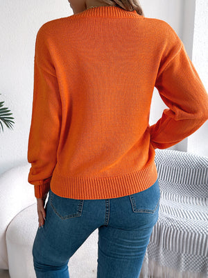 100% polyester Care instructions: Machine wash cold pullover sweater in Burgundy with relaxed silhouette