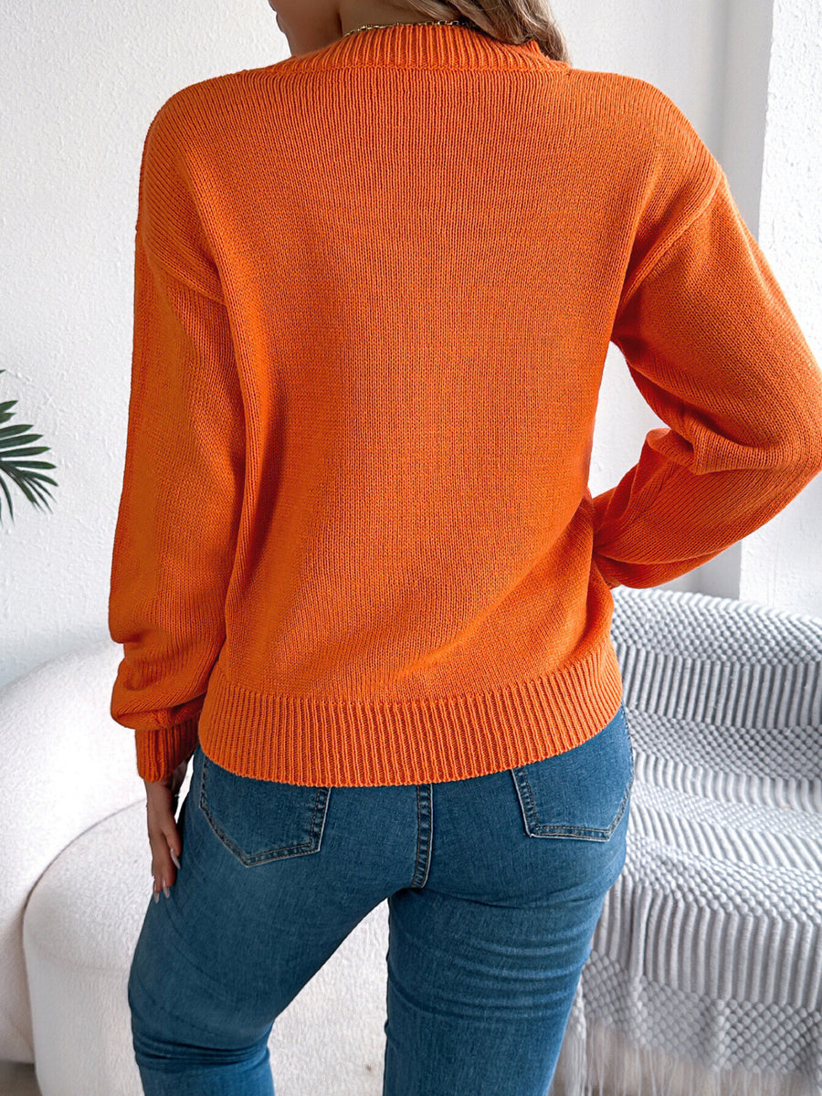 100% polyester Care instructions: Machine wash cold pullover sweater in Burgundy with relaxed silhouette