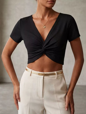 Black twist-front V-neck cropped t-shirt with short sleeves.