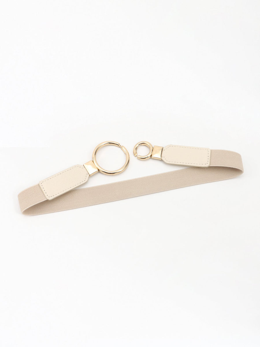 Interlocked ring elastic waist belt in tan with gold hardware and faux leather accents.