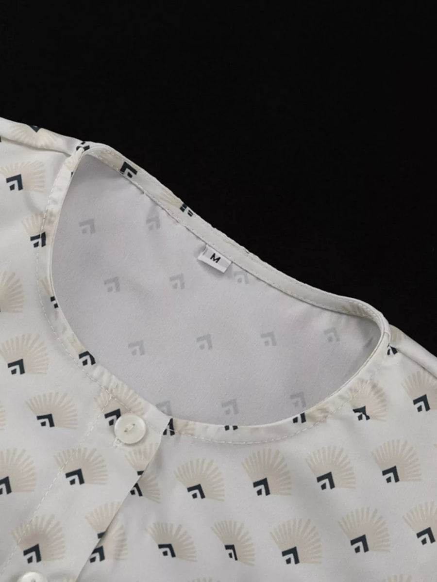 White button-up blouse with a fan and square pattern, crew neck, short sleeves