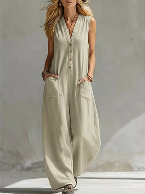 Beige linen blend sleeveless v-neck jumpsuit with button front and wide legs