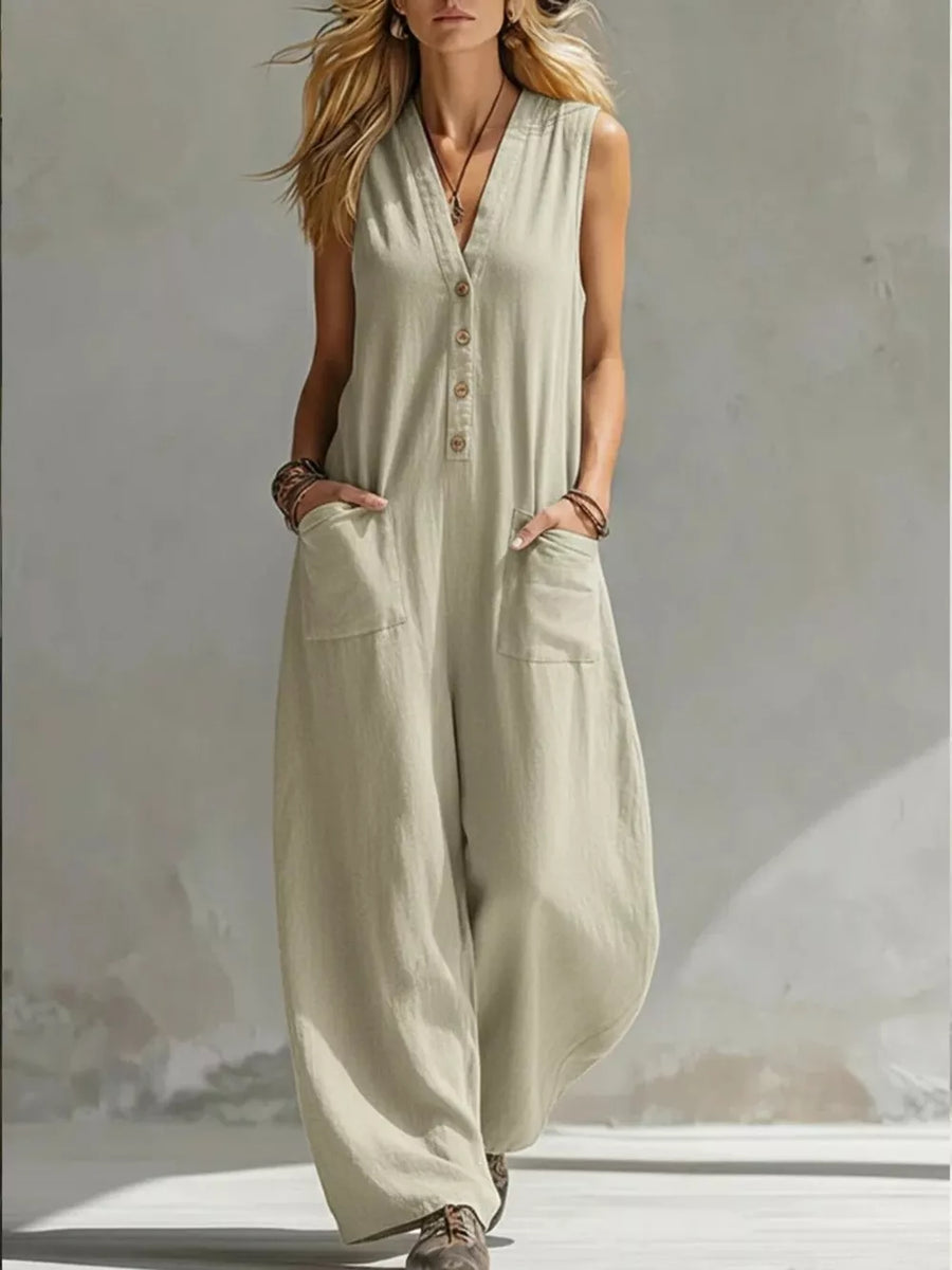Beige linen blend sleeveless v-neck jumpsuit with button front and wide legs