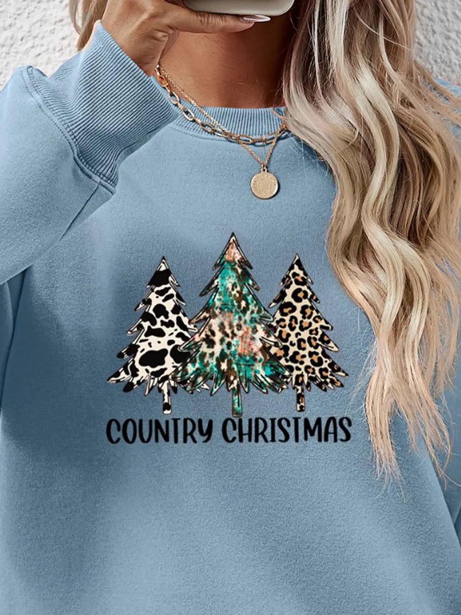 Misty Blue graphic sweatshirt with country Christmas trees and text.