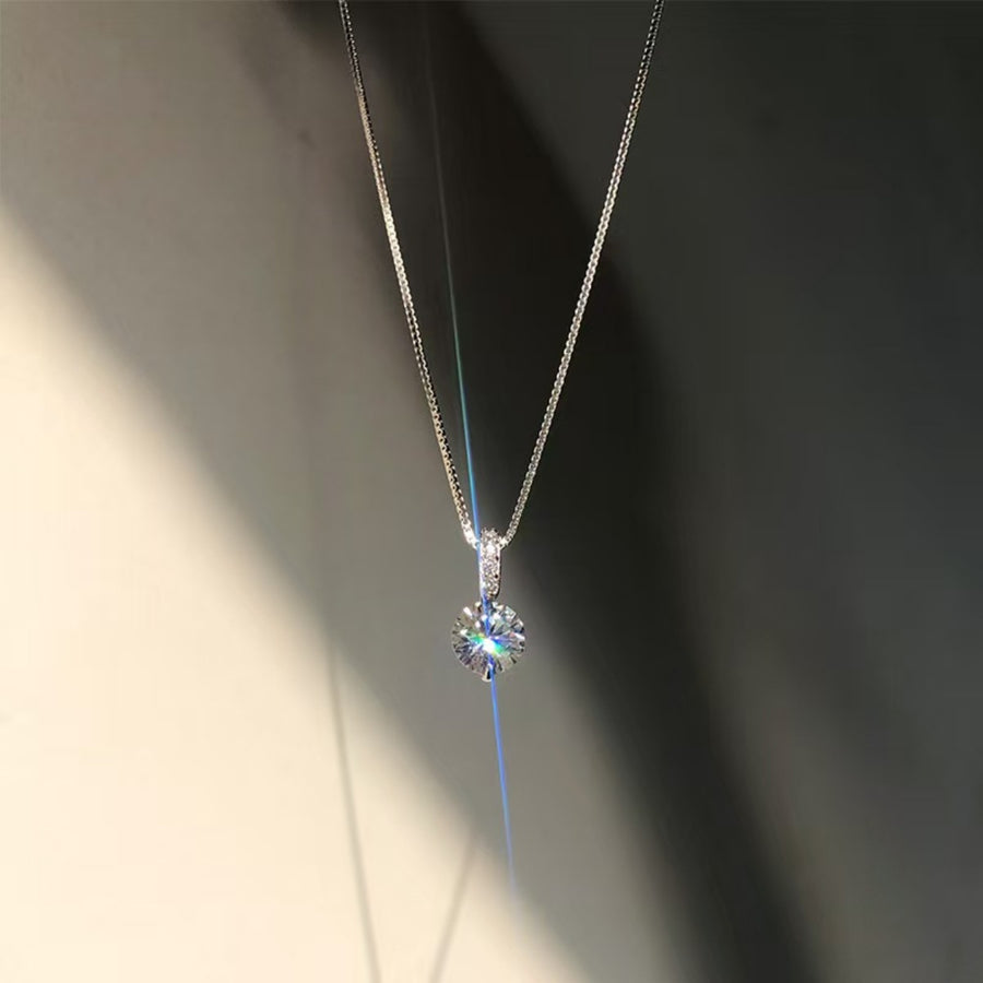 925 sterling silver,Moissanite Carat weight: 1ct Care instructions: Avoid wearin necklace in clear with delicate silhouette