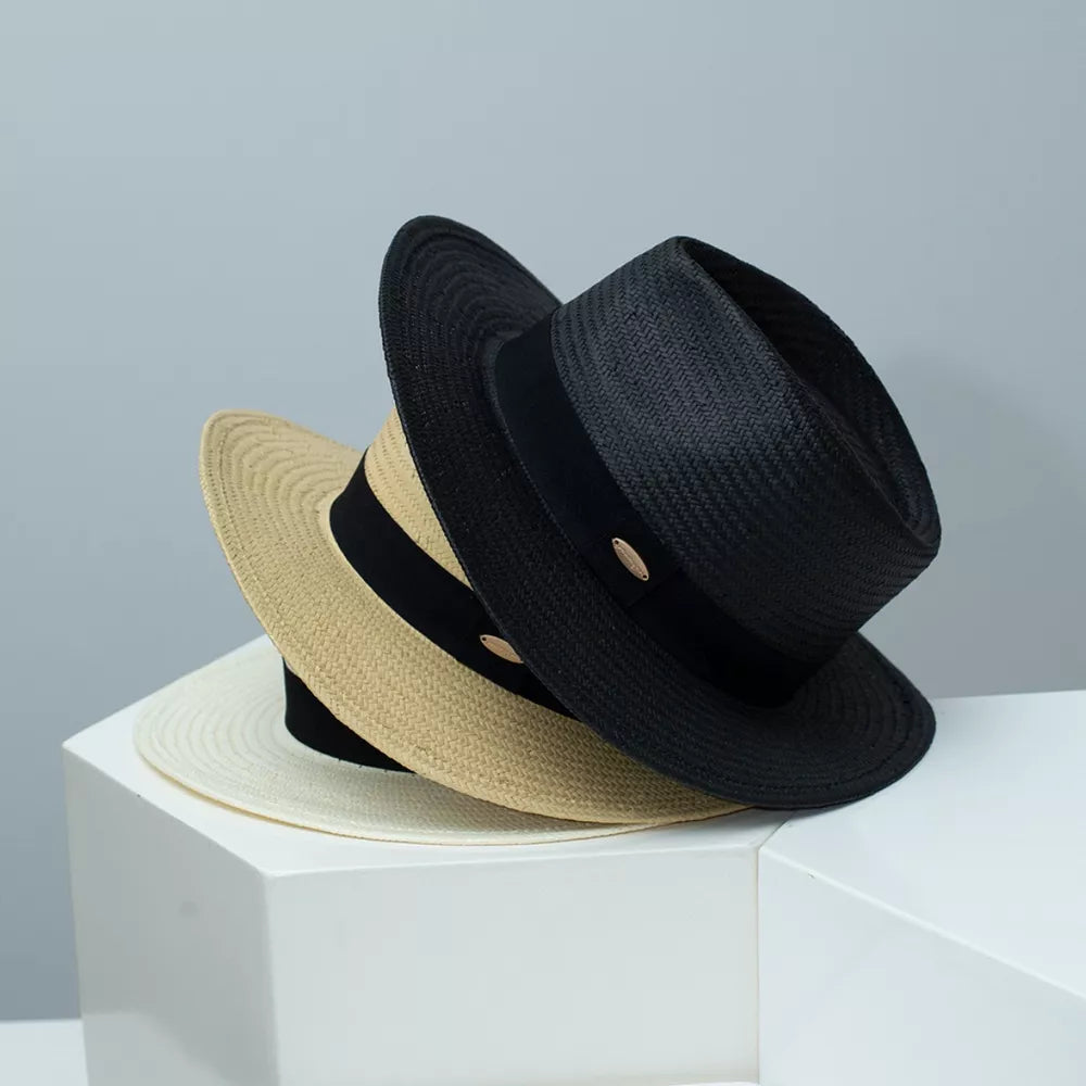 Women's classic boater sun hats in black, beige, and ivory white with black ribbon trim.