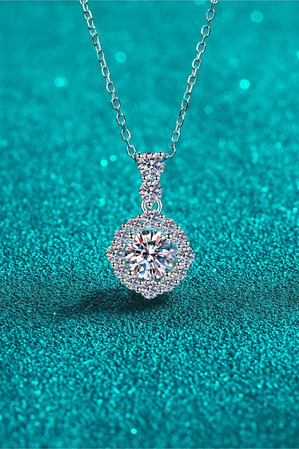 Halo moissanite pendant necklace in sterling silver with delicate chain