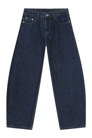 Faded baggy denim trousers in dark blue, featuring a classic five-pocket design and wide legs.