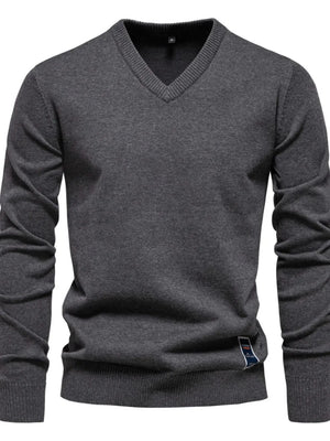 Dark Gray ribbed knit V-neck sweater with a small logo tag on the hem.