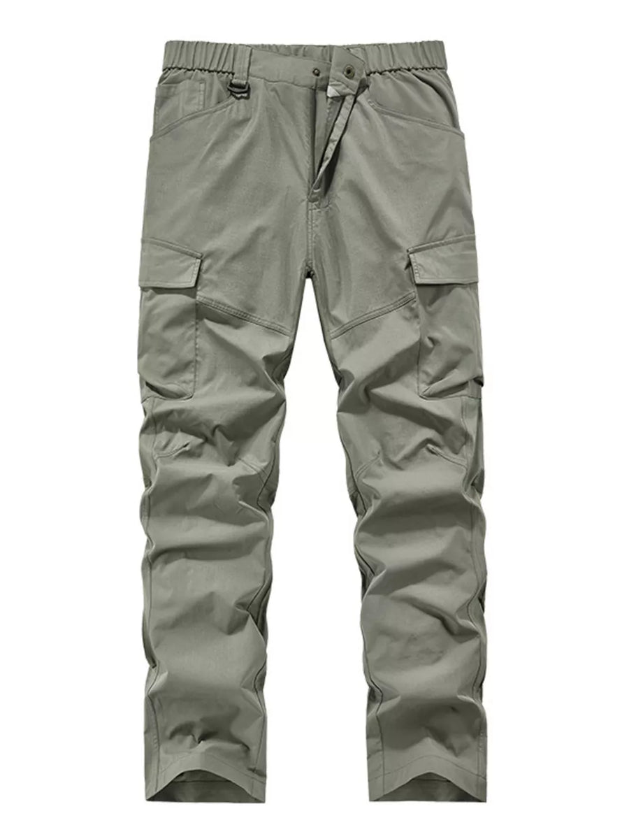 Sage cargo pants with elastic waist and drawstring, featuring multiple pockets.
