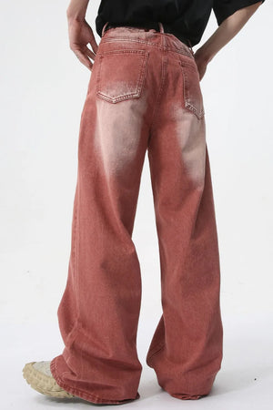 Sunset dip-dye wide leg jeans in rust with a faded wash and relaxed fit.