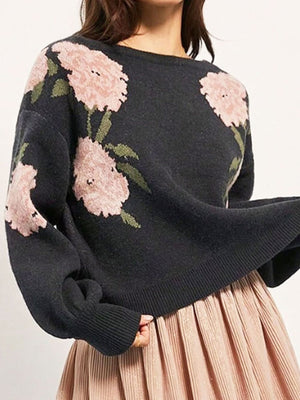 blush pink pullover sweater featuring dropped shoulder and floral