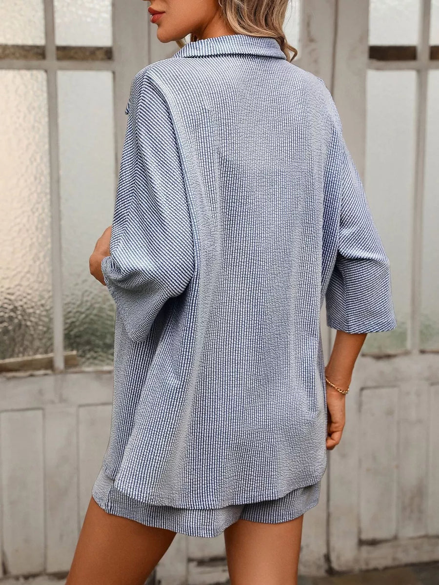 Textured light blue two-piece set with classic collar and button-down shirt.