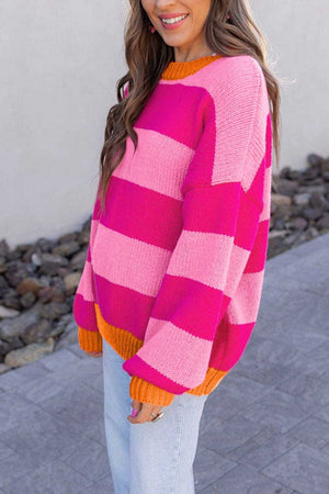 light pink pullover sweater featuring dropped shoulder and striped