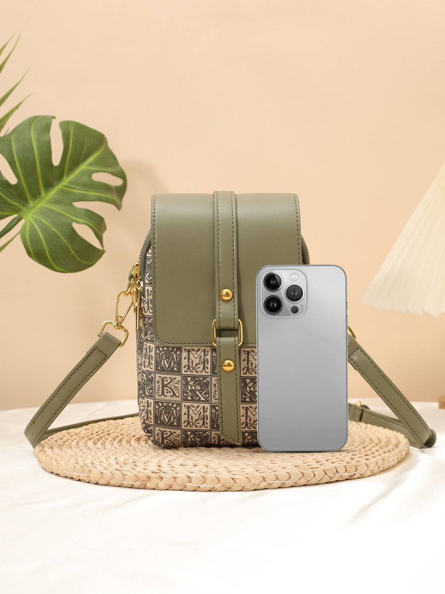crossbody bag in sage green with geometric and flap closure