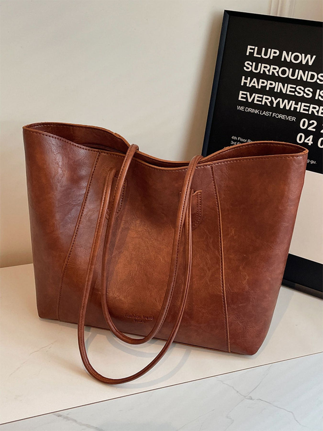 Premium crinkled pu leather tote bag in coffee brown with double shoulder straps.