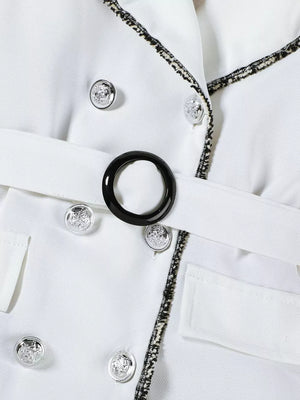 White double-breasted toddler dress with belted waist and decorative buttons.