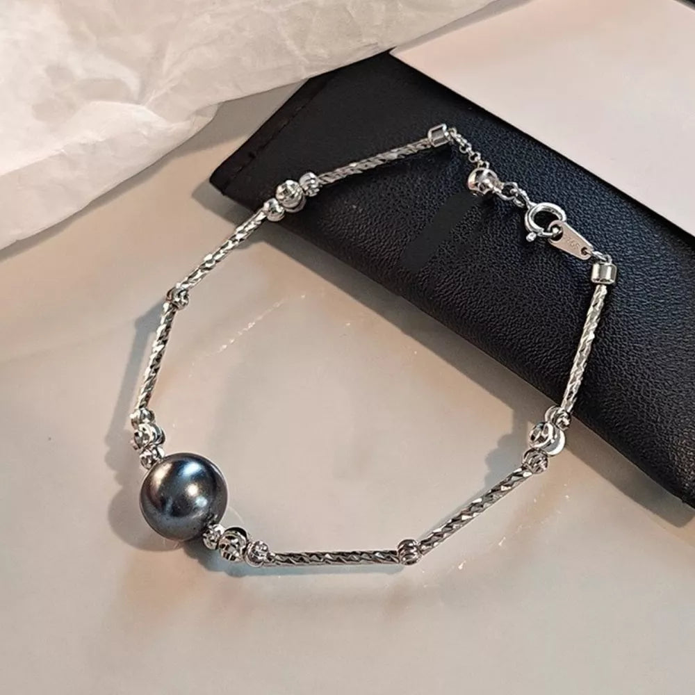 ACCESSORIES in silver featuring pearl accent and linked fit