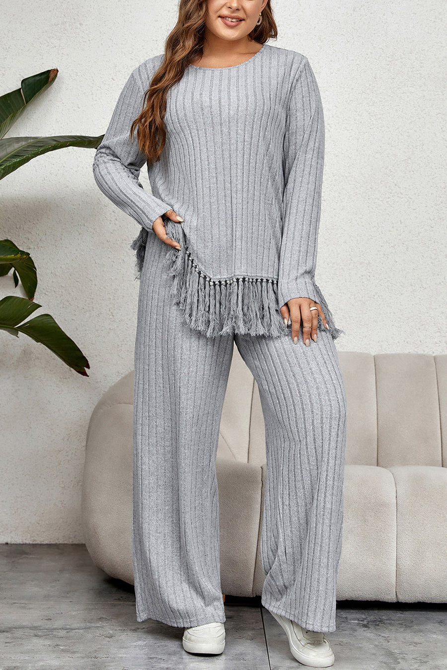 Ribbed lounge set in grey with fringe hem detail and wide leg pants.