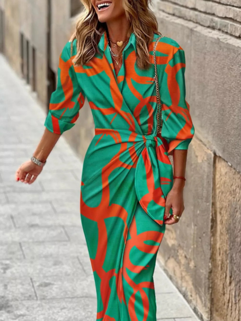 Green abstract patterned shirt dress with 3/4 sleeves and waist tie