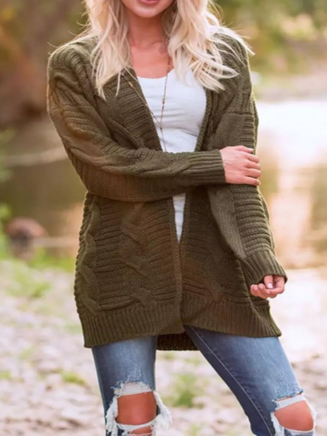 Army green textured cable knit duster cardigan with open front and long sleeves.