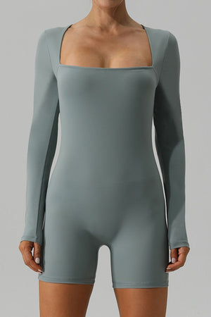 Light green long sleeve unitard with square neckline and short legs