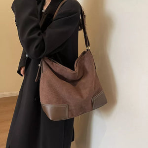 Brown suede tote bag with leather accents and contrast stitching