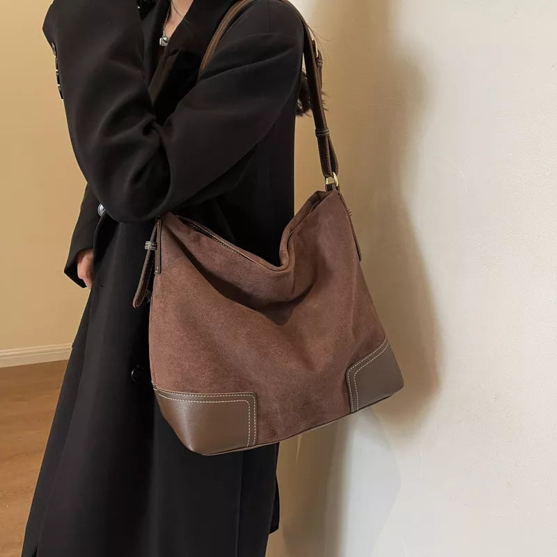 Brown suede tote bag with leather accents and contrast stitching