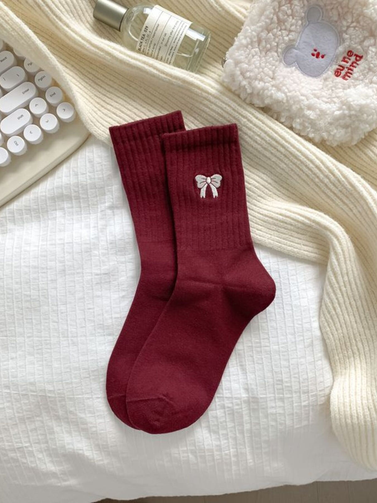 socks in cream with ribbed knit and crew length