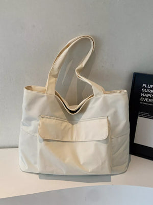 Spacious cream nylon shoulder bag with flap and front pocket