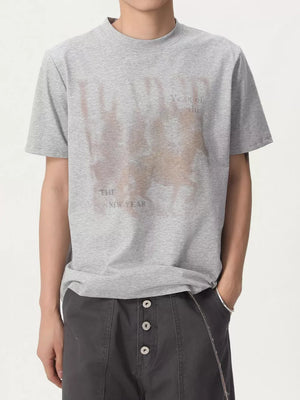 Grey cotton blend t-shirt with vintage graphic print and crew neck.