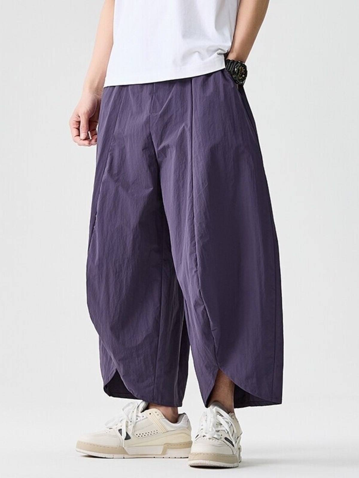 95%polyester,5%spandex Care instructions: Machine wash cold harem pants in Purple with loose silhouette
