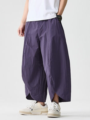 95%polyester,5%spandex Care instructions: Machine wash cold harem pants in Purple with loose silhouette