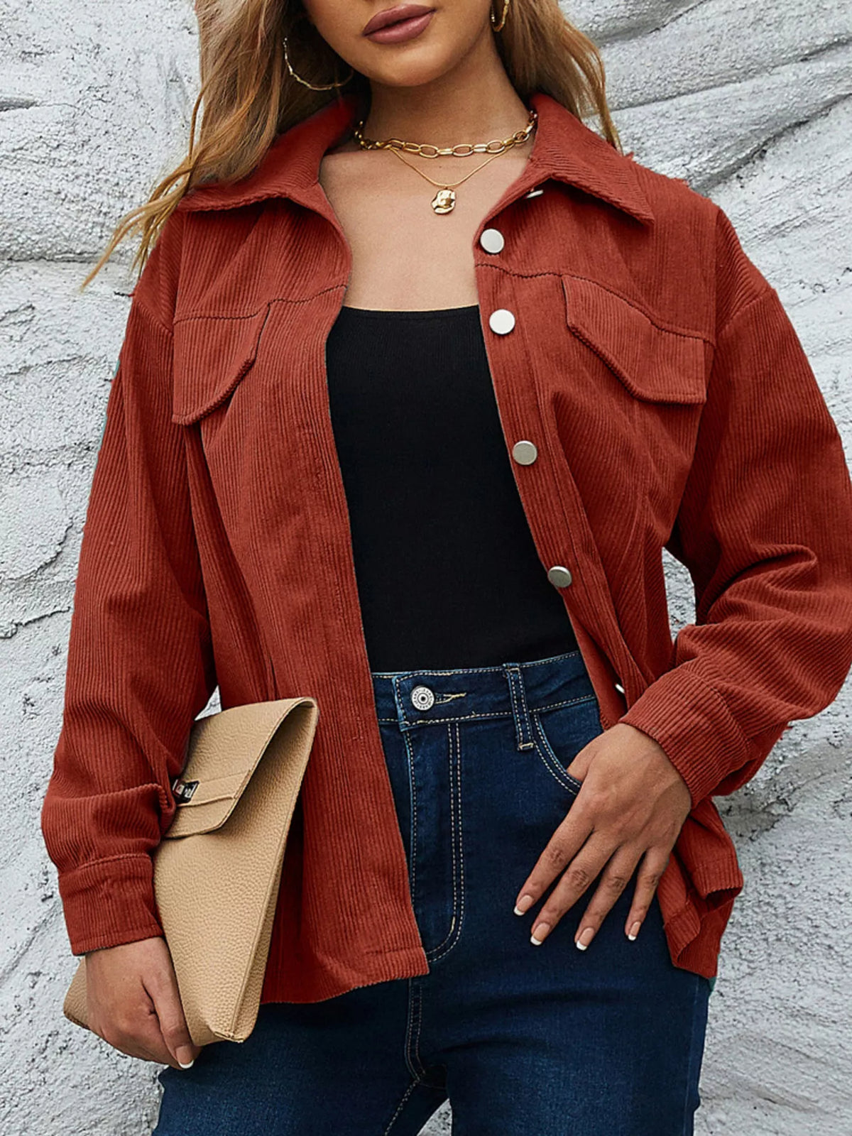 Textured corduroy button-up jacket in Amber with silver buttons and chest pockets.