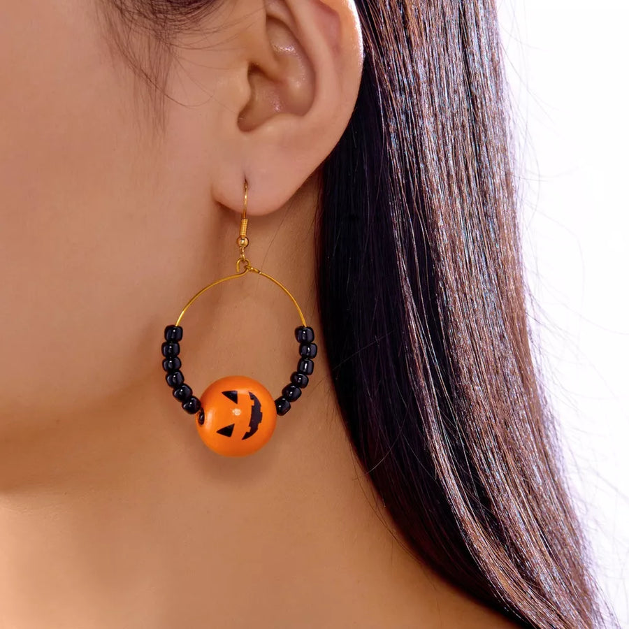 earrings featuring spiderweb in gold with 18K Gold-Plated, Iron, Foam balls Care instructions: 1 texture