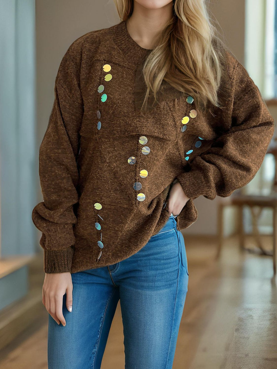 Brown knit sweater with round sequin embellishments and a crew neck.