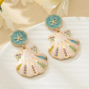 18K Gold-Plated,Alloy,Rhinestone Care instructions: While wearing the pearl jewe earrings in teal with dangle silhouette