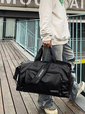 Black canvas travel bag with versatile straps and multiple pockets.
